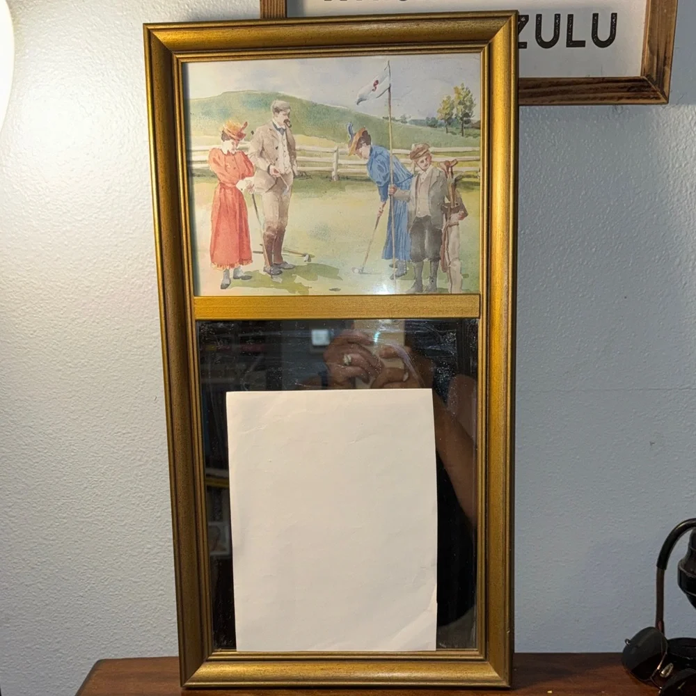 Vintage Golf Art Print Above a Mirror in a Decorative Gold Colred Frame